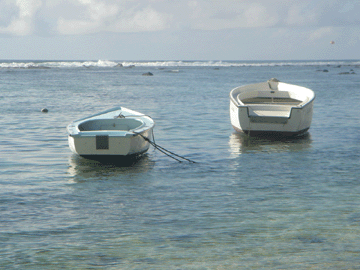 Boats at beach in Mauritius